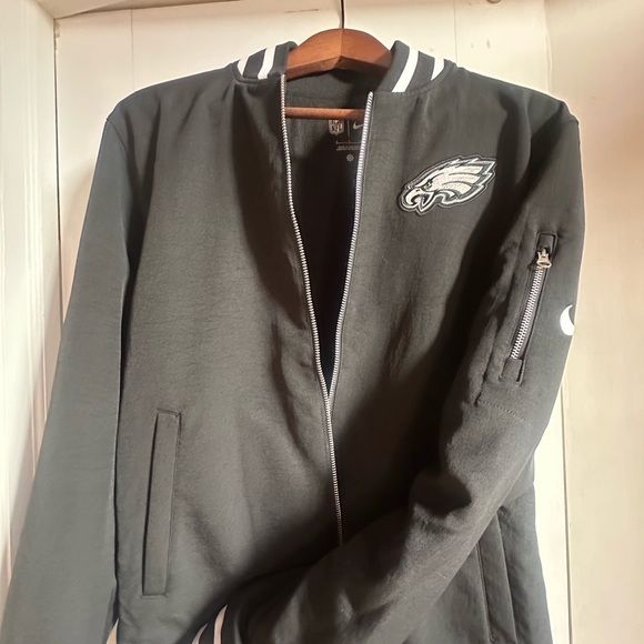 Philadelphia Eagles Nike Black Jacket. Zip pickets, original tags, never worn